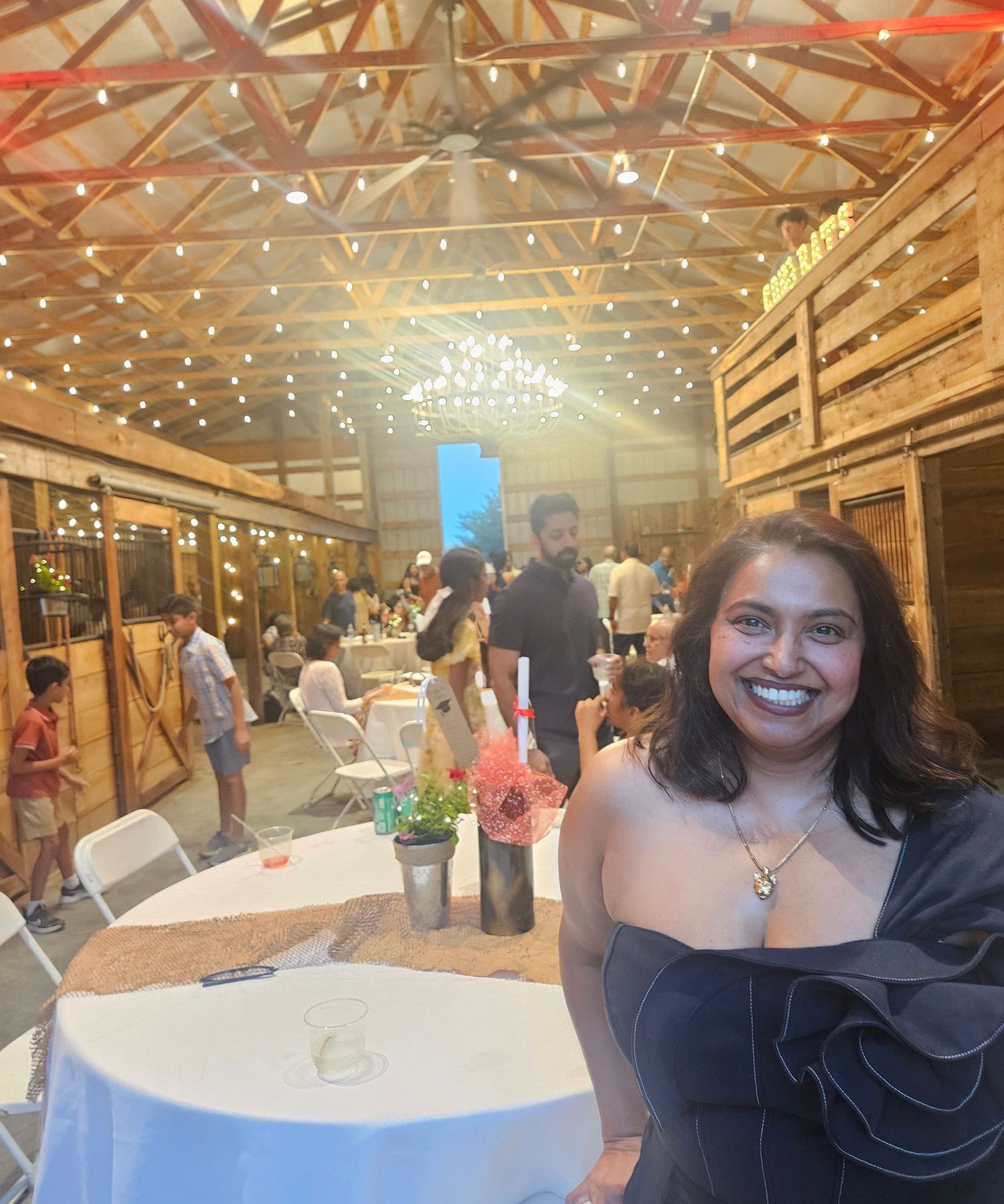 Guests celebrating inside The Barn at Red Brick Ranch, Hocking Hills Ohio